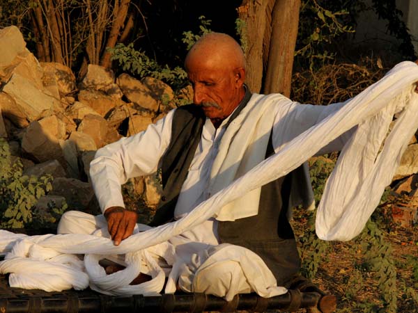Practice of turban tying in RajasthanPractice of turban tying in Rajasthan