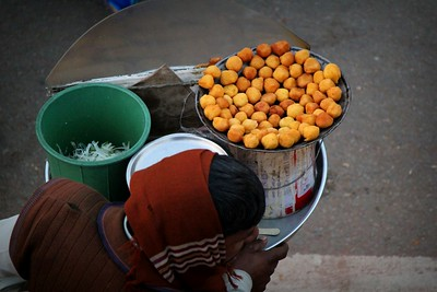 A Vendor selling Ram-Laddu, Image Source: Flickr