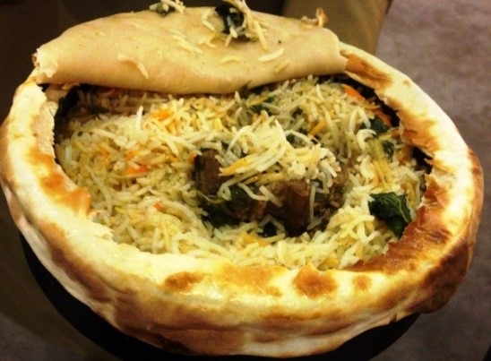  Biryani cooked in the Dum Pukht style