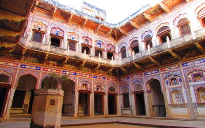 Intricately painted walls of the courtyard of a Haveli in Mandawa
