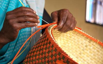Baskets being woven out of palm-leaves